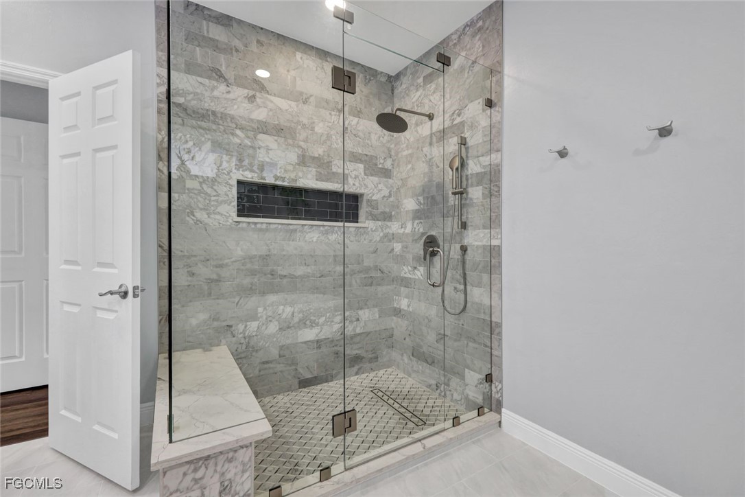 5346 Southwest 10th Avenue Cape Coral, FL 33914 - Photo 20 of 50 a bathroom with a shower