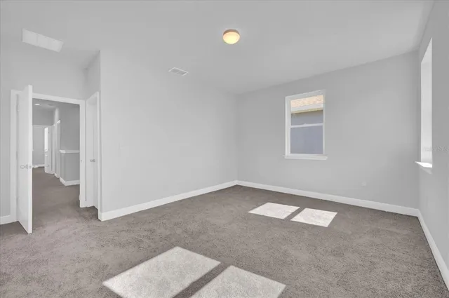 an empty room with an entryway