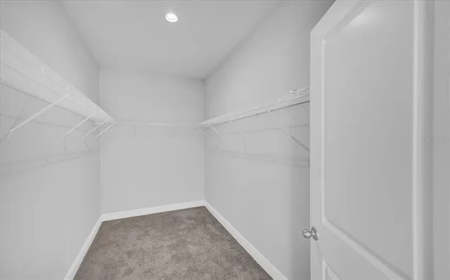 a bathroom with double sink and a mirror