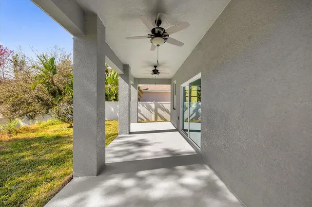 an aerial view of residential building with parking space