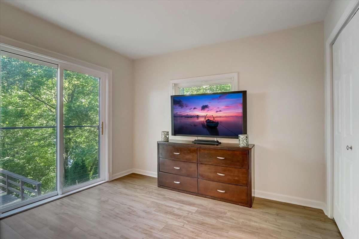124 Hickory Road Lake In The Hills, IL 60156 - Photo 15 of 49 a living room with furniture and a flat screen tv