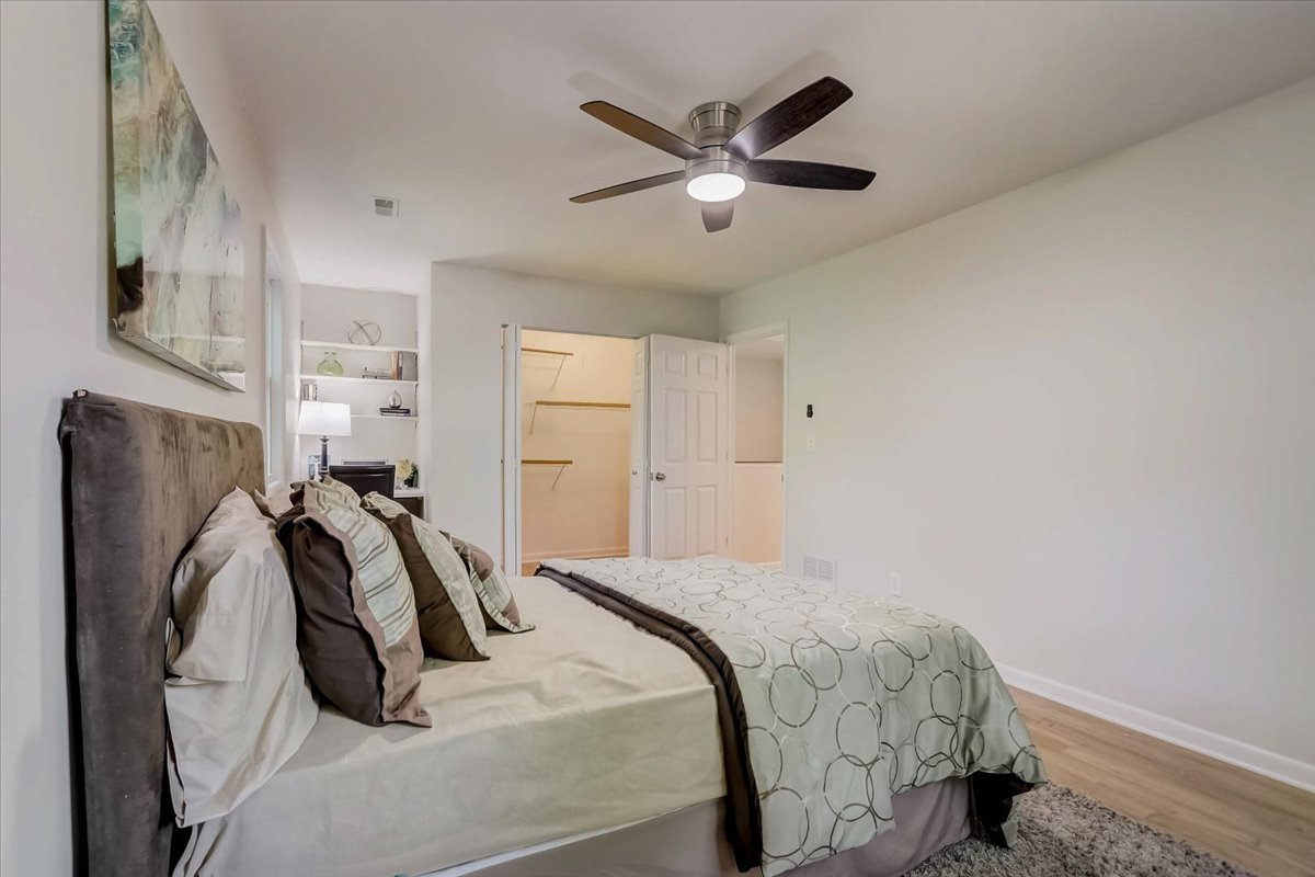 124 Hickory Road Lake In The Hills, IL 60156 - Photo 19 of 49 a bedroom with a bed and a ceiling fan