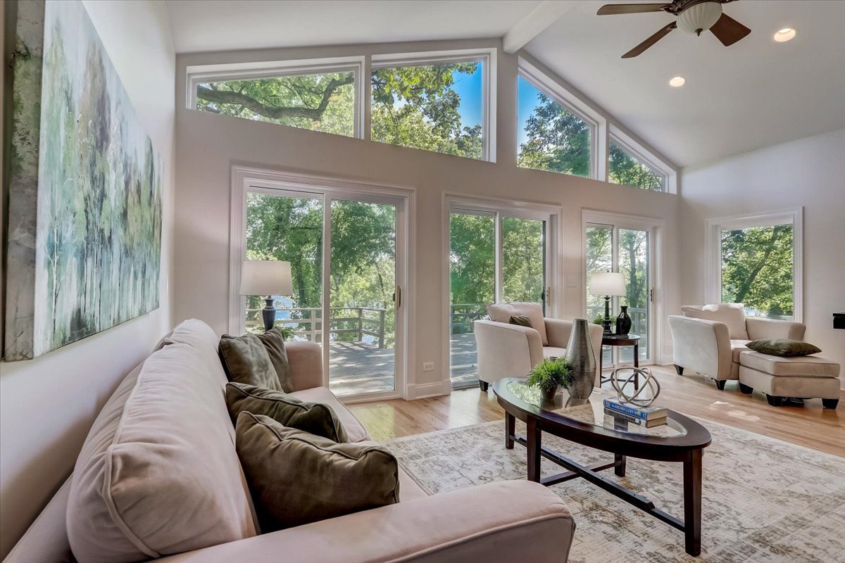 124 Hickory Road Lake In The Hills, IL 60156 - Photo 2 of 49 a living room with furniture and a large window