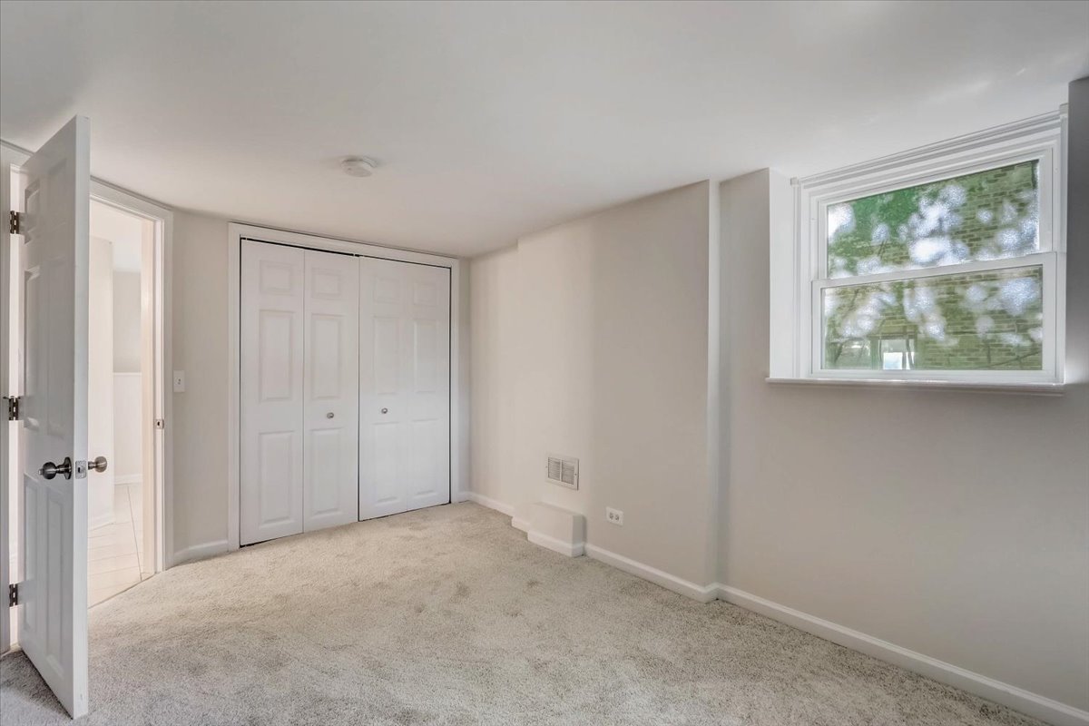 124 Hickory Road Lake In The Hills, IL 60156 - Photo 26 of 49 a view of an empty room with a window