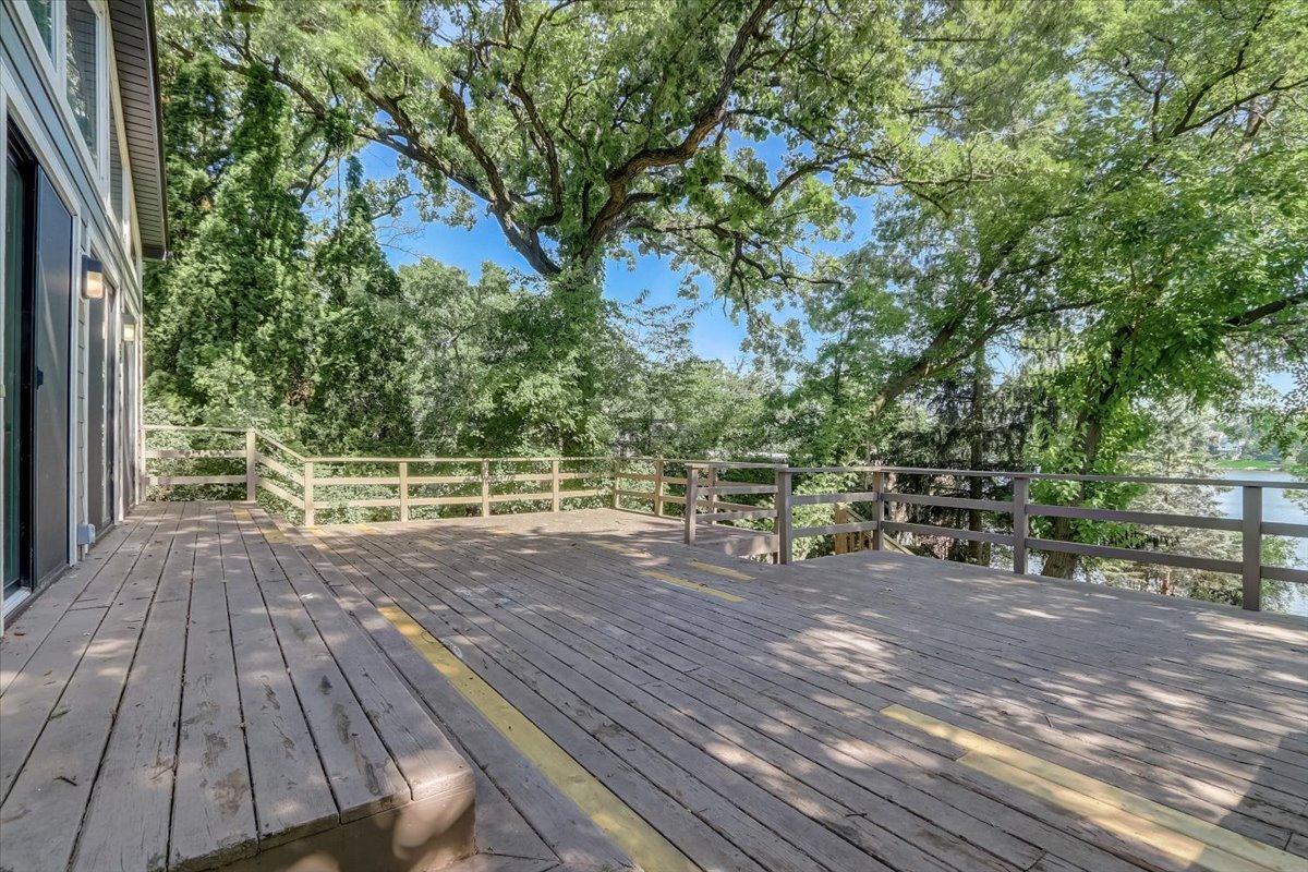 124 Hickory Road Lake In The Hills, IL 60156 - Photo 32 of 49 a view of a backyard with wooden floor and fence