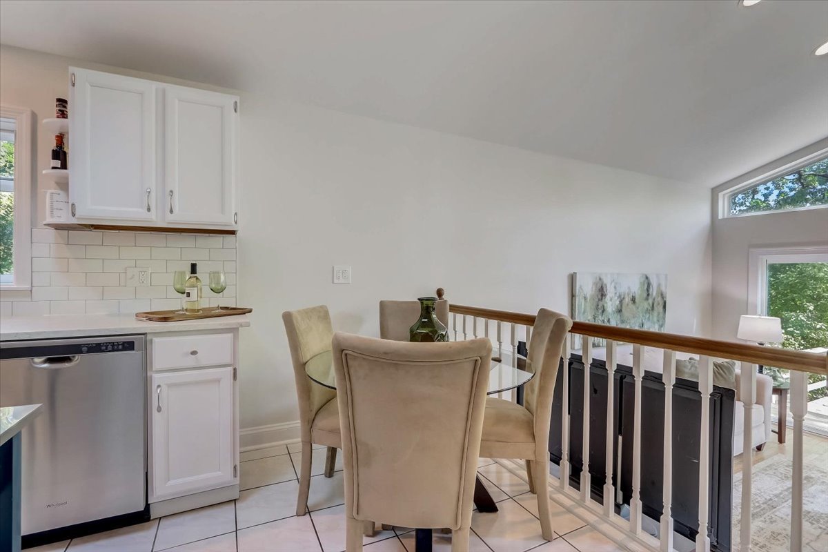 124 Hickory Road Lake In The Hills, IL 60156 - Photo 10 of 49 a view of a kitchen and dining room