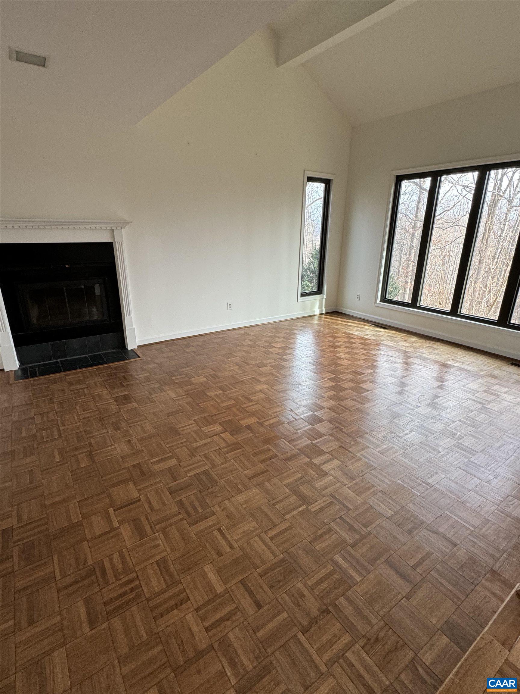 609 Dry Bridge Road Charlottesville, VA 22903 - Photo 3 of 3 a view of empty room with window and fireplace