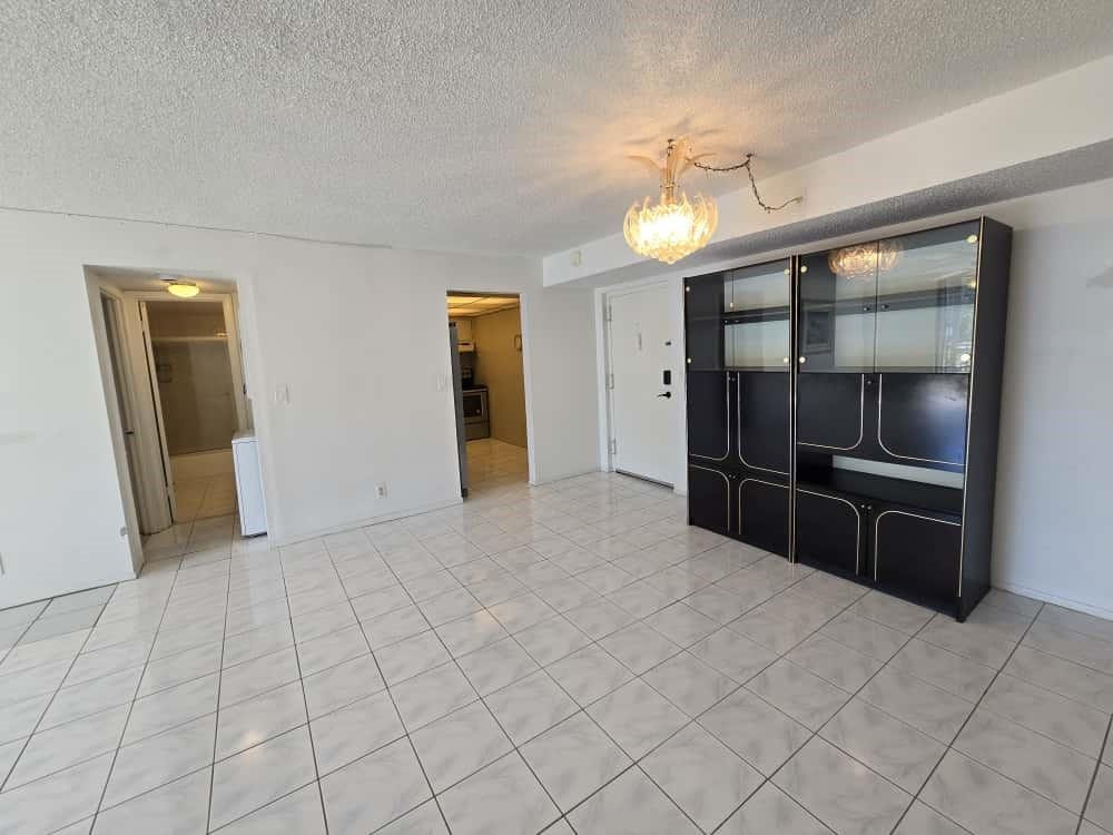 6195 Rock Island Road, Unit 209 Tamarac, FL 33319 - Photo 15 of 40 a room with closet and windows