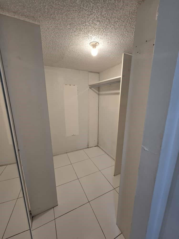 6195 Rock Island Road, Unit 209 Tamarac, FL 33319 - Photo 27 of 40 a bathroom with a shower