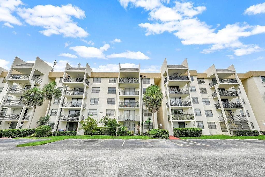 6195 Rock Island Road, Unit 209 Tamarac, FL 33319 - Photo 5 of 40 a front view of a building