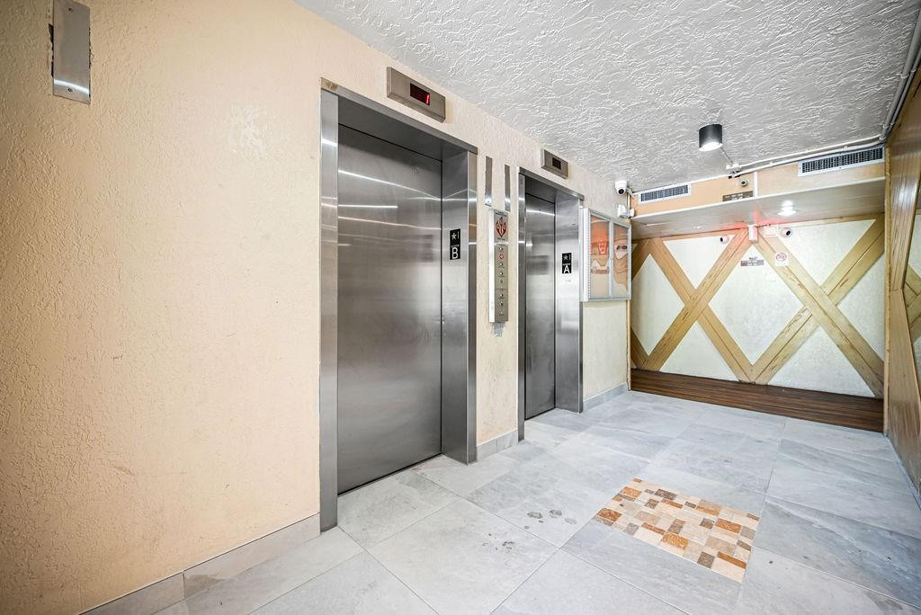 6195 Rock Island Road, Unit 209 Tamarac, FL 33319 - Photo 10 of 40 a view of empty room