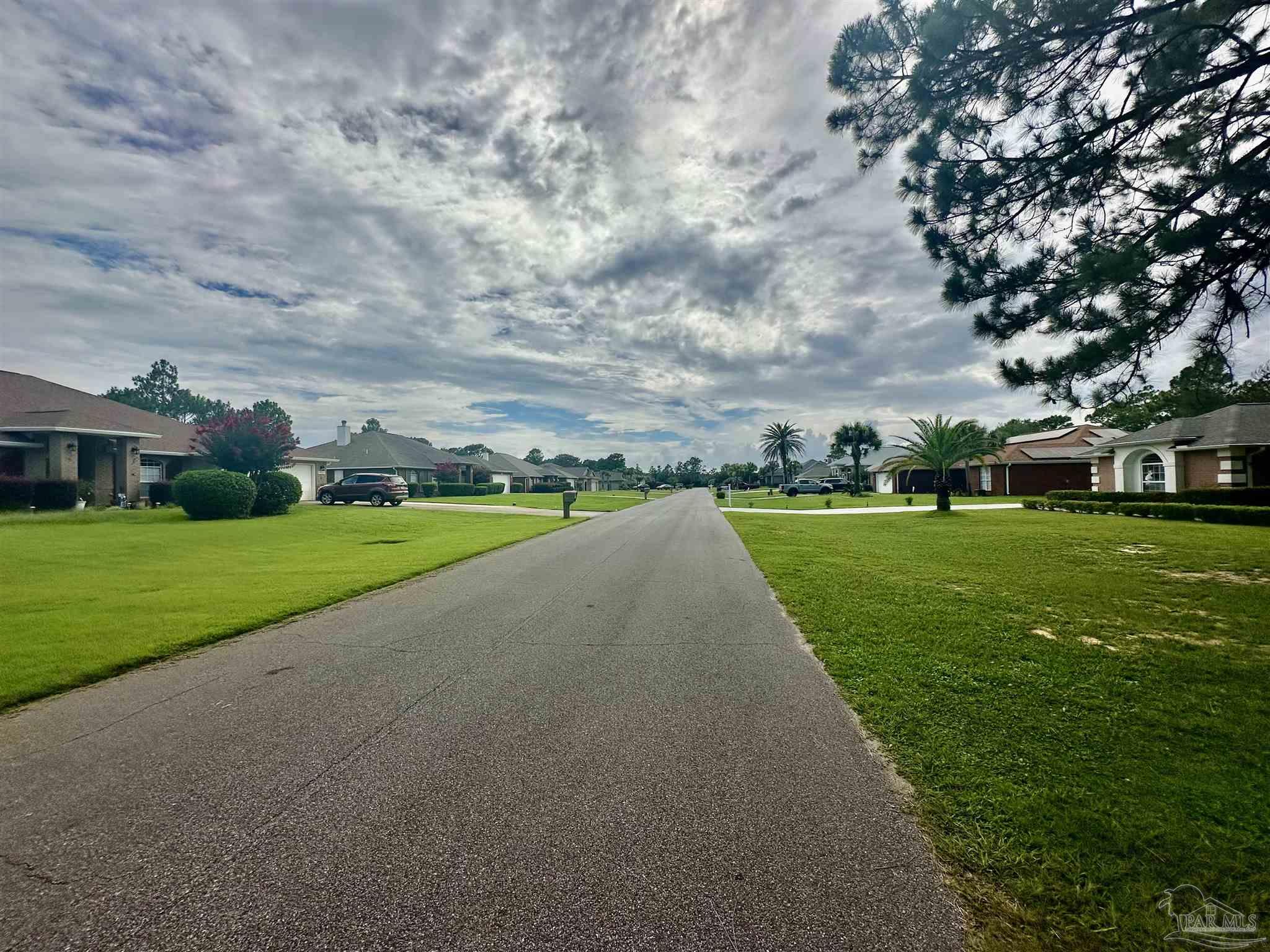 Tbd Brinkley Street Navarre, FL 32566 - Photo 4 of 7 a view of building with outdoor space