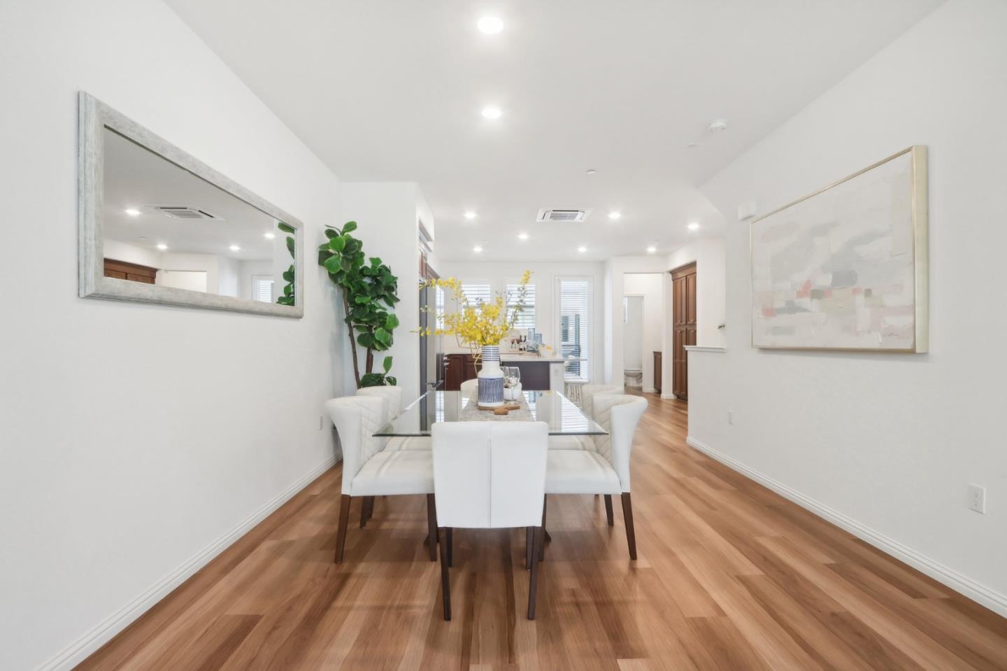 5766 Stealth Loop San Jose, CA 95119 - Photo 12 of 48 a view of a dining room with furniture and wooden floor