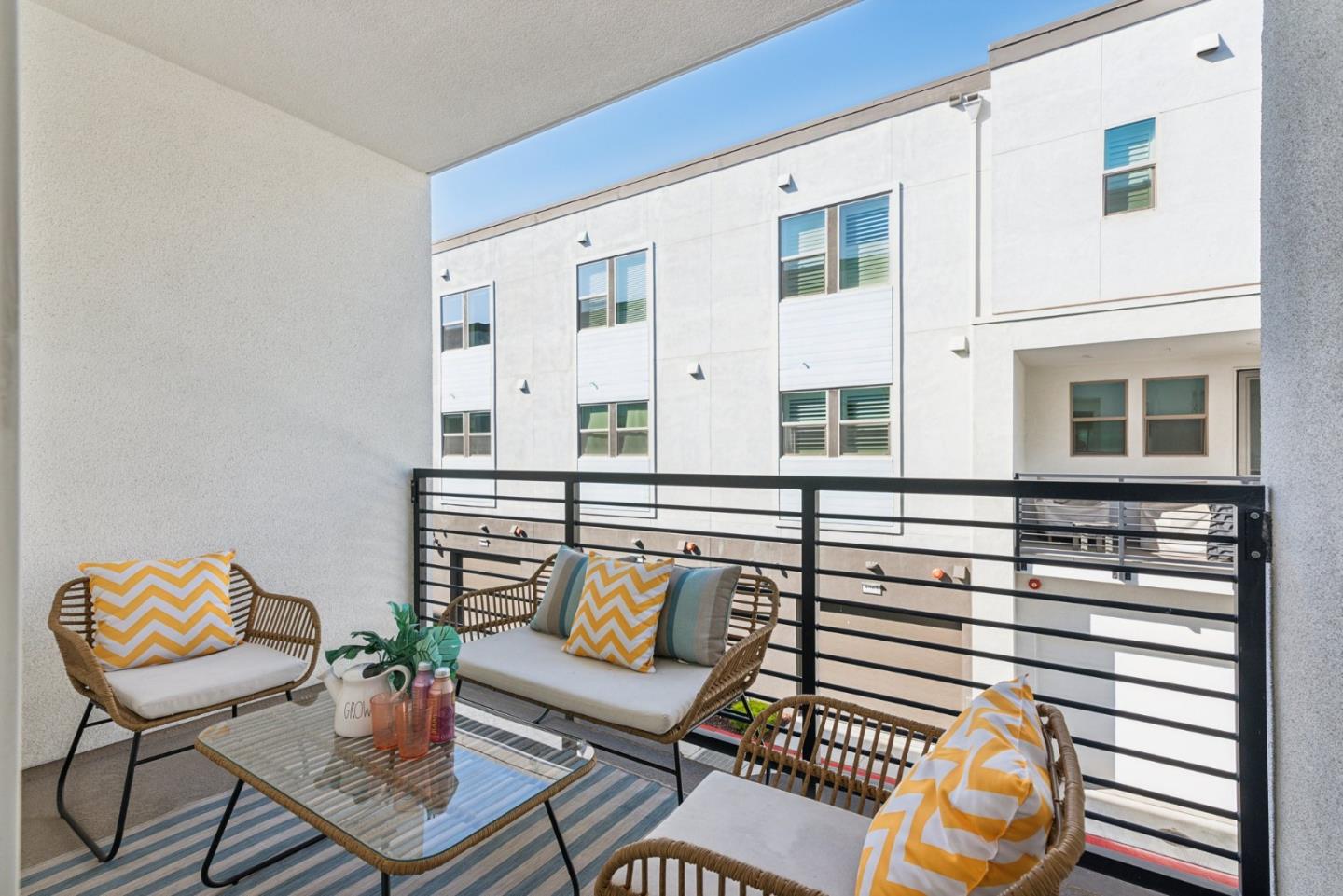 5766 Stealth Loop San Jose, CA 95119 - Photo 20 of 48 a view of a chairs and table in a balcony