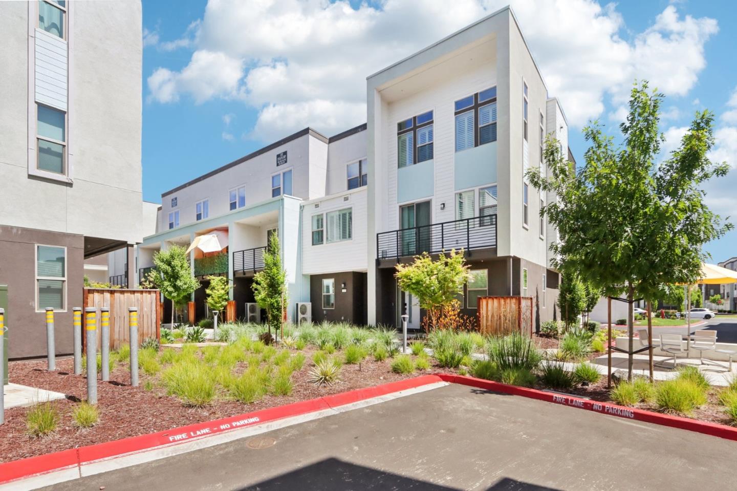 5766 Stealth Loop San Jose, CA 95119 - Photo 2 of 48 front view of a building with a street