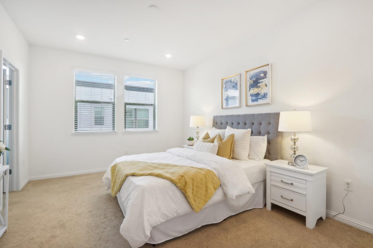 5766 Stealth Loop San Jose, CA 95119 - Photo 24 of 48 a bedroom with a bed and a night stand