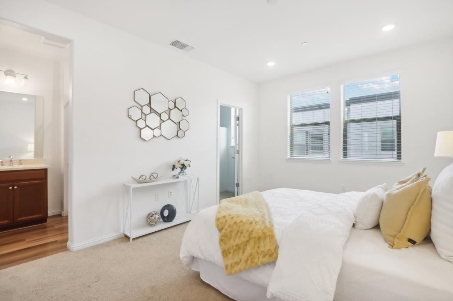 5766 Stealth Loop San Jose, CA 95119 - Photo 25 of 48 a bedroom with a bed and a window