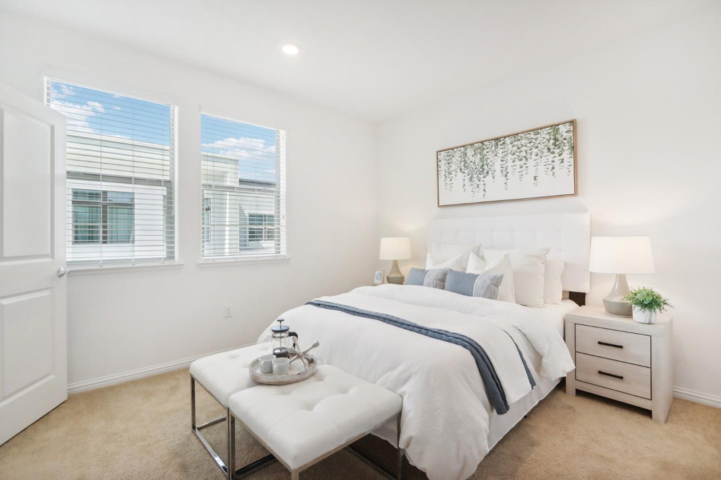 5766 Stealth Loop San Jose, CA 95119 - Photo 29 of 48 a bedroom with a bed and wooden floor