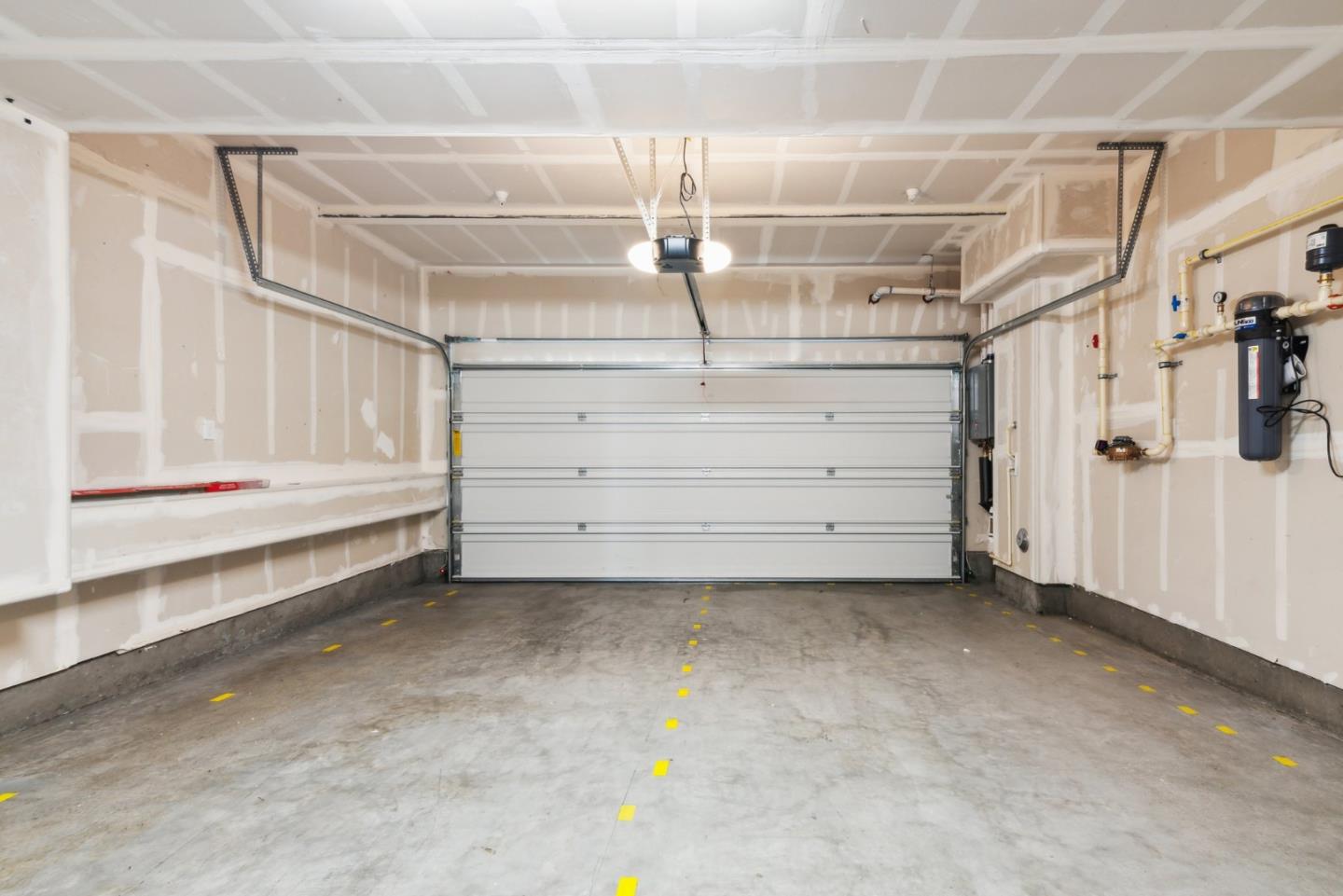 5766 Stealth Loop San Jose, CA 95119 - Photo 31 of 48 a view of a room with racks on the wall