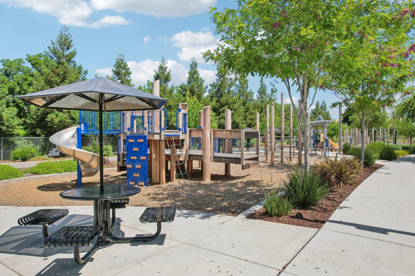 5766 Stealth Loop San Jose, CA 95119 - Photo 38 of 48 a view of a outdoor sitting area with golf course