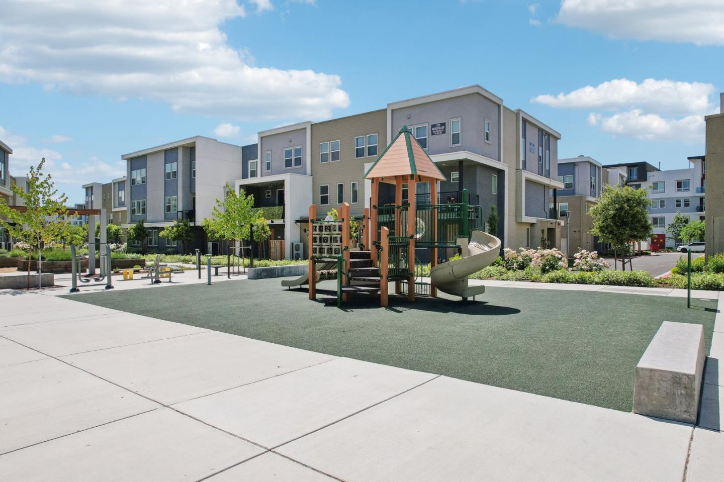 5766 Stealth Loop San Jose, CA 95119 - Photo 39 of 48 a view of a building with a yard
