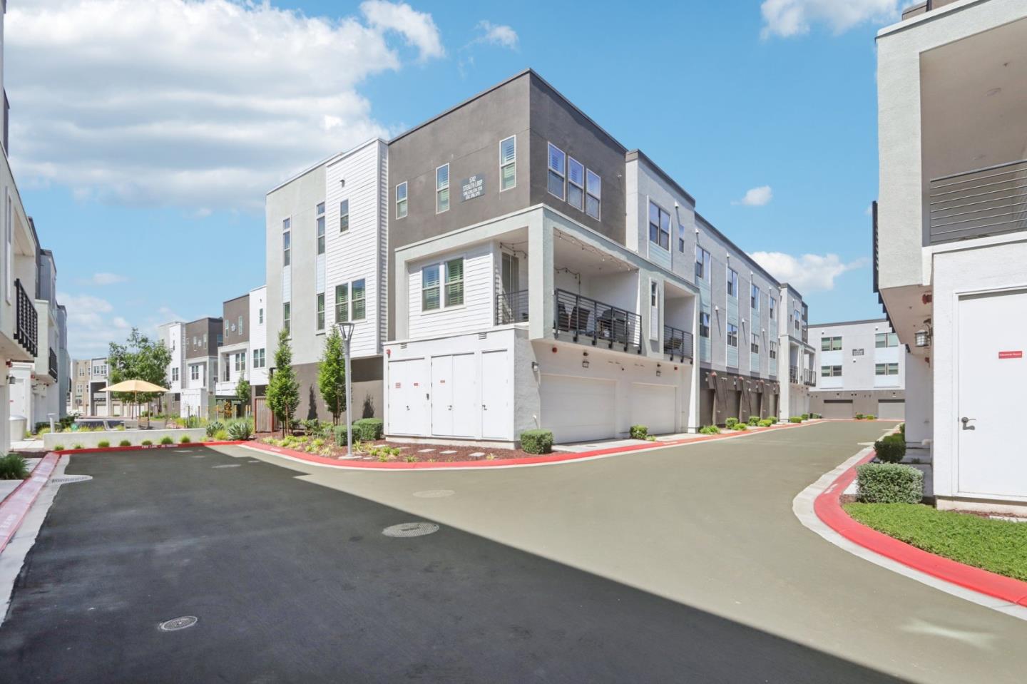 5766 Stealth Loop San Jose, CA 95119 - Photo 43 of 48 a front view of a building with street