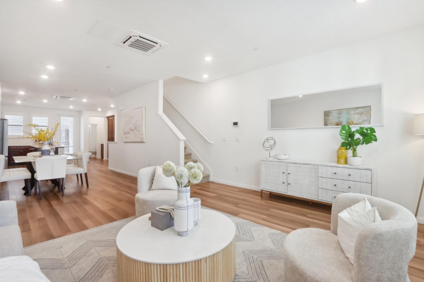 5766 Stealth Loop San Jose, CA 95119 - Photo 10 of 48 a living room with furniture and wooden floor