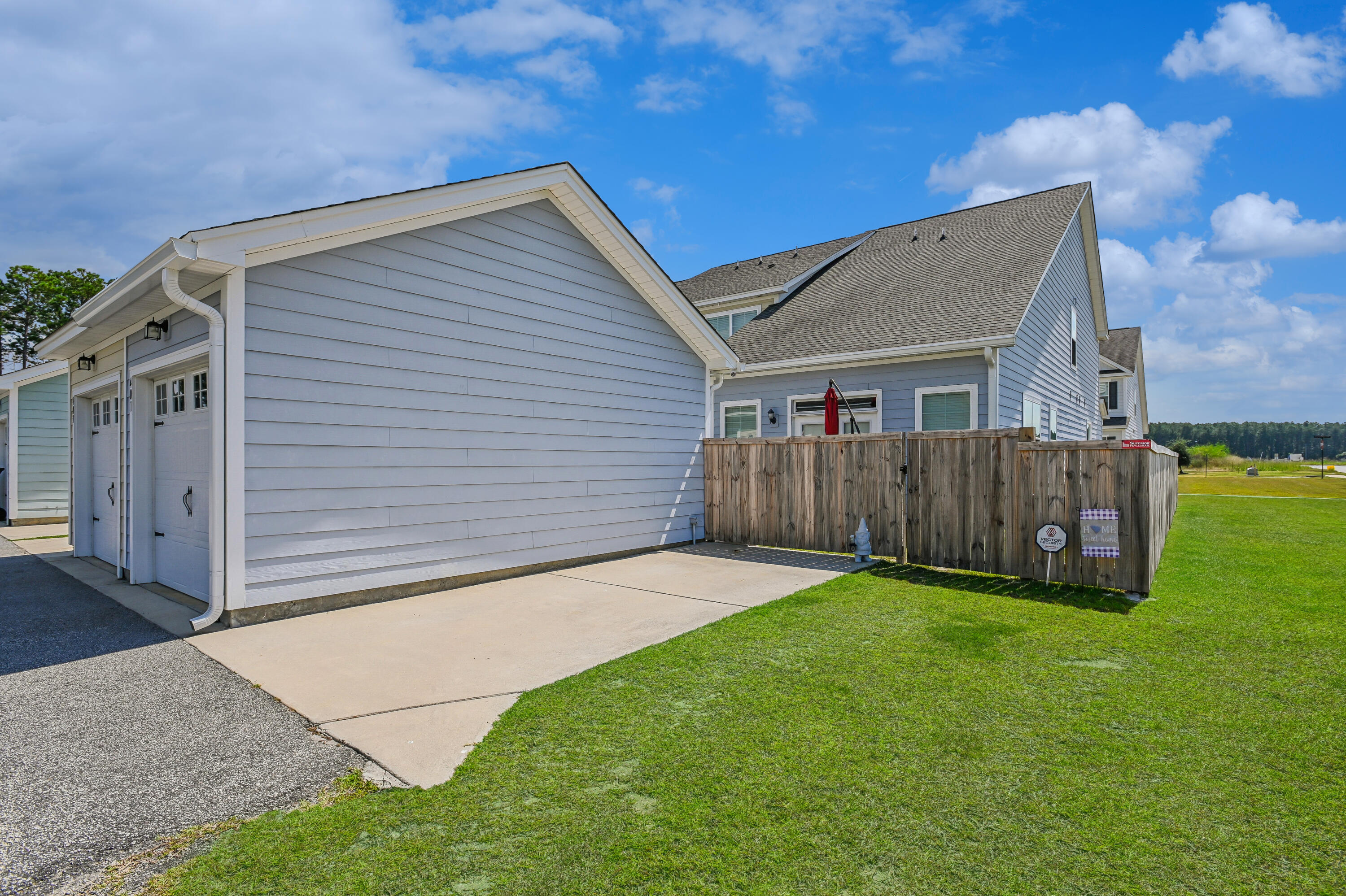 401 Stoneleigh Lane Moncks Corner, SC 29461 - Photo 26 of 32 Garage & Backyard