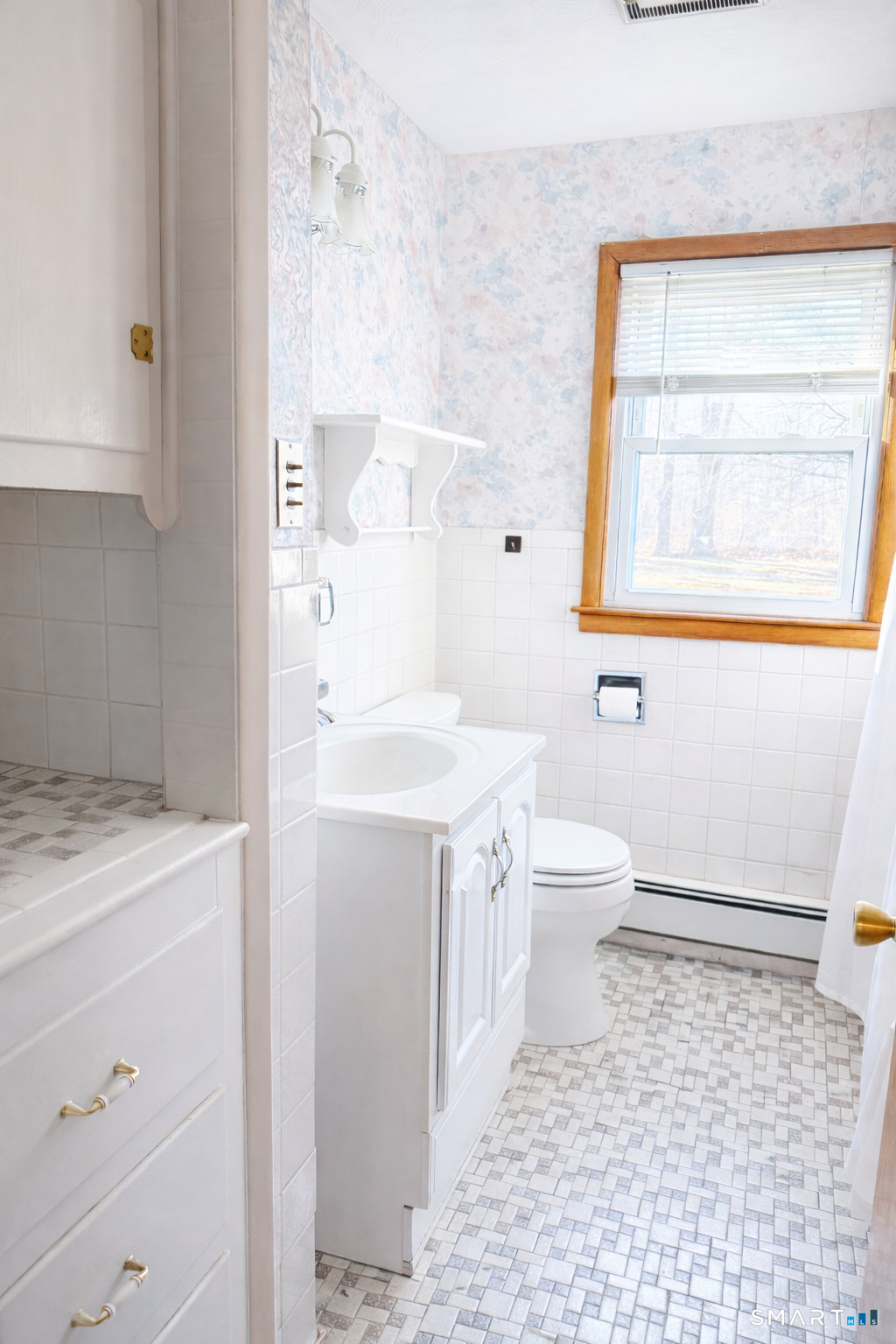 5 Edmund Lane Enfield, CT 06082 - Photo 6 of 11 a bathroom with a sink a toilet and a bathtub