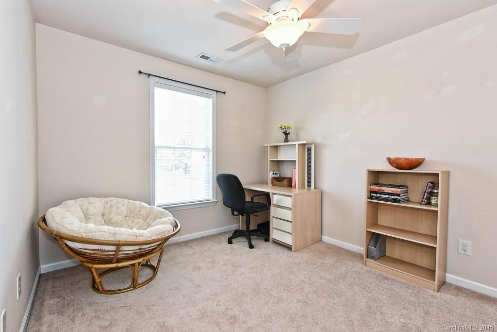 4719 Lapis Court Fort Mill, SC 29708 - Photo 21 of 24 a view of a livingroom with furniture and a window