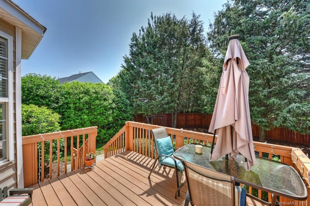 4719 Lapis Court Fort Mill, SC 29708 - Photo 22 of 24 a view of deck with furniture and trees