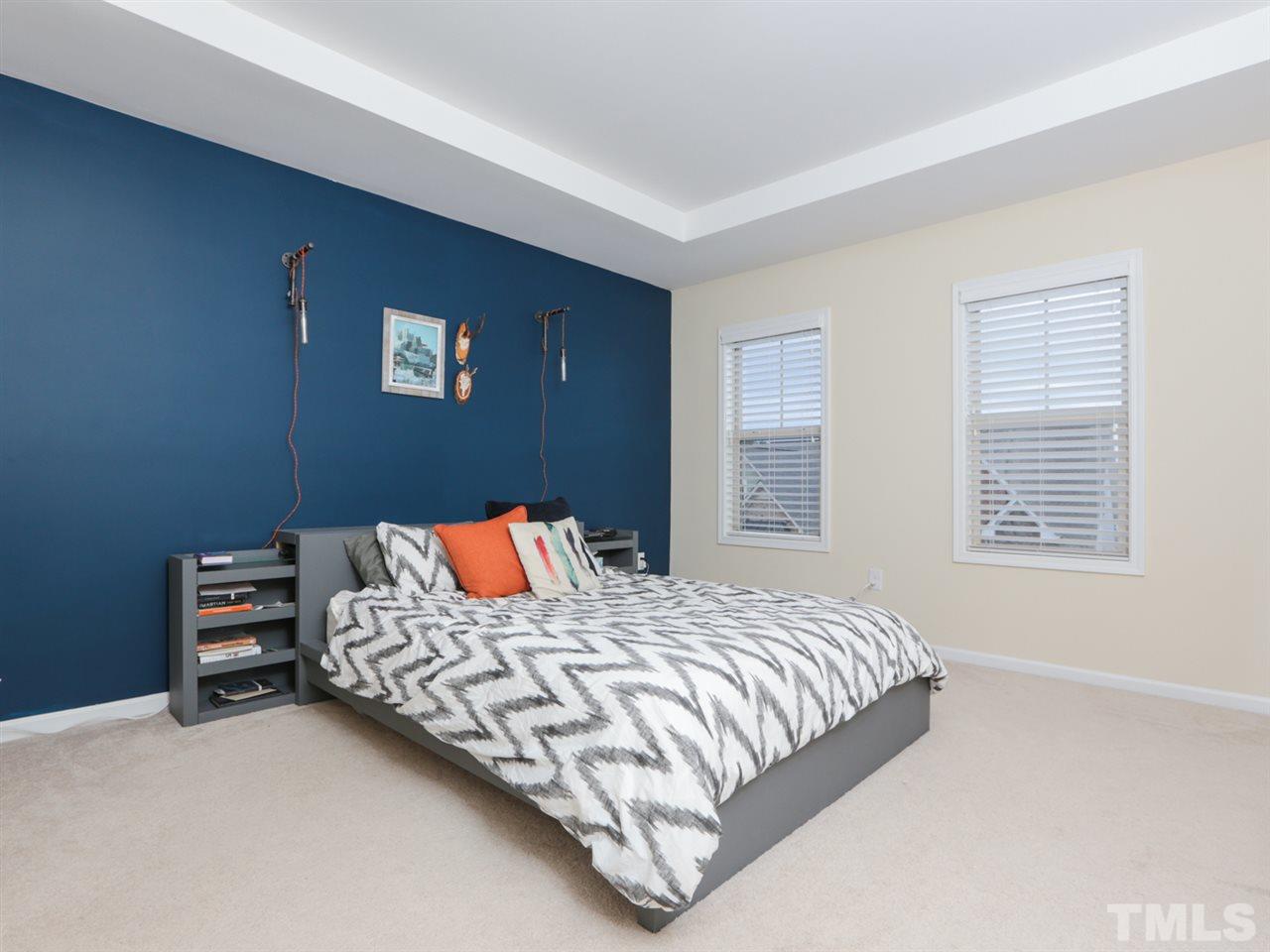1543 Crafton Way Raleigh, NC 27607 - Photo 12 of 25 a bedroom with a bed and a window