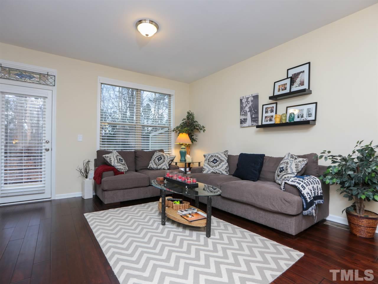 1543 Crafton Way Raleigh, NC 27607 - Photo 3 of 25 a living room with furniture and a window
