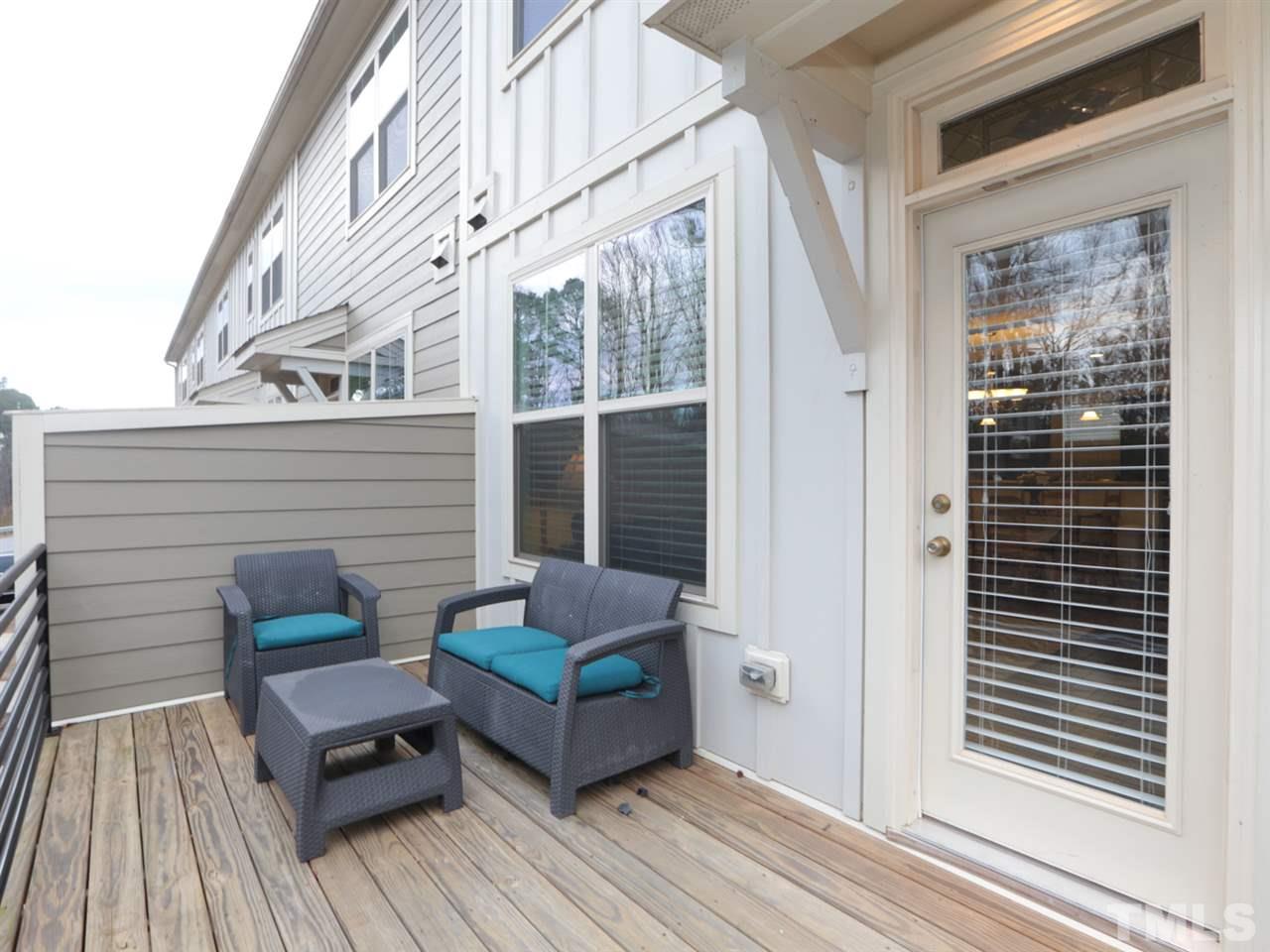 1543 Crafton Way Raleigh, NC 27607 - Photo 21 of 25 a view of a two chairs in the balcony