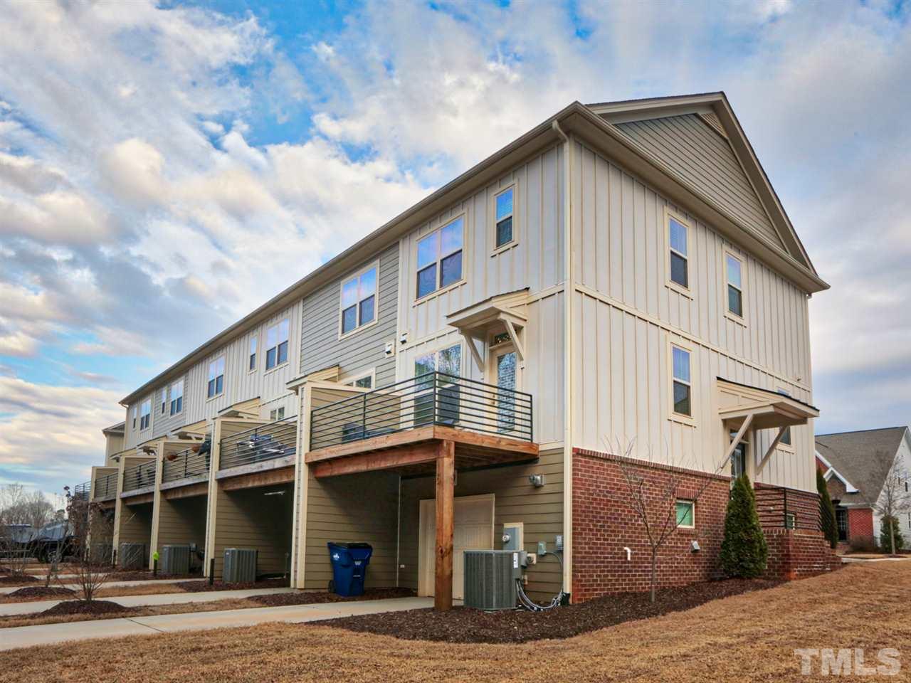 1543 Crafton Way Raleigh, NC 27607 - Photo 23 of 25 a front view of a building with street