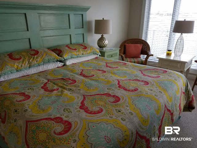 28875 Perdido Beach Boulevard, Unit 1A Orange Beach, AL 36561 - Photo 7 of 25 Large Master Bedroom with views of ole River and walk out to Patio