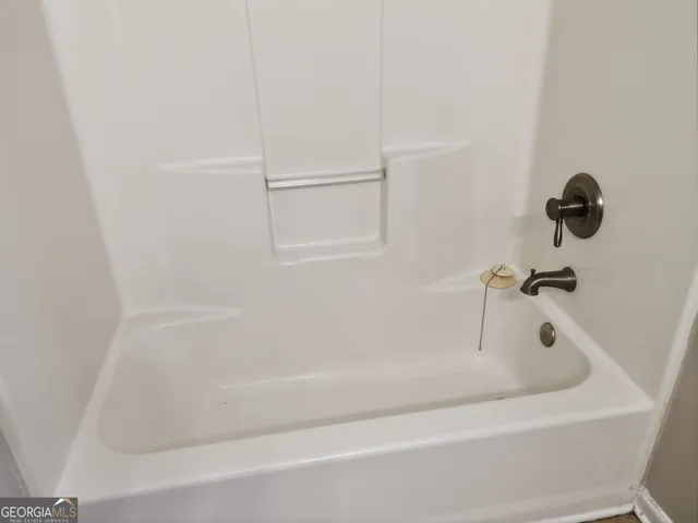a close up of a bathtub
