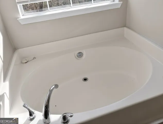 a bathroom with a bathtub
