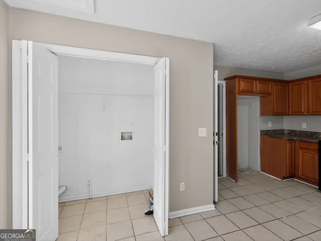 a view of room with closet area