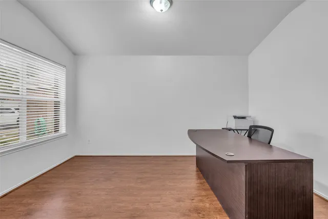 a bathroom with a sink and a window