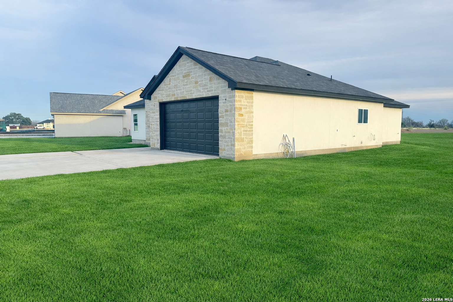 705 34th Street Hondo, TX 78861 - Photo 2 of 4 a big house with a big yard and more large windows
