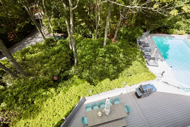 a view of yard from a balcony