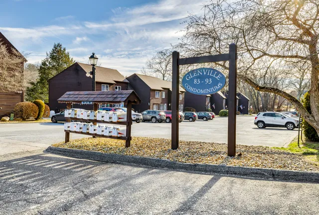 a view of a street with houses
