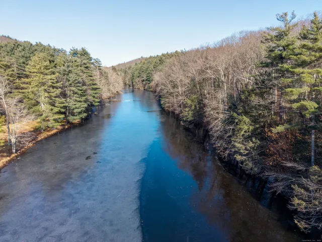 a view of a lake with mountain