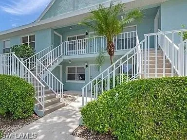 front view of a house with a deck