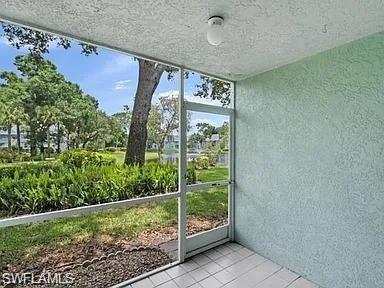 109 Wading Bird Circle, Unit V102 Naples, FL 34110 - Photo 6 of 15 a view of a pathway