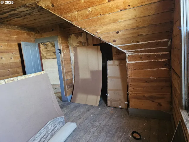 a view of a porch with furniture and a window