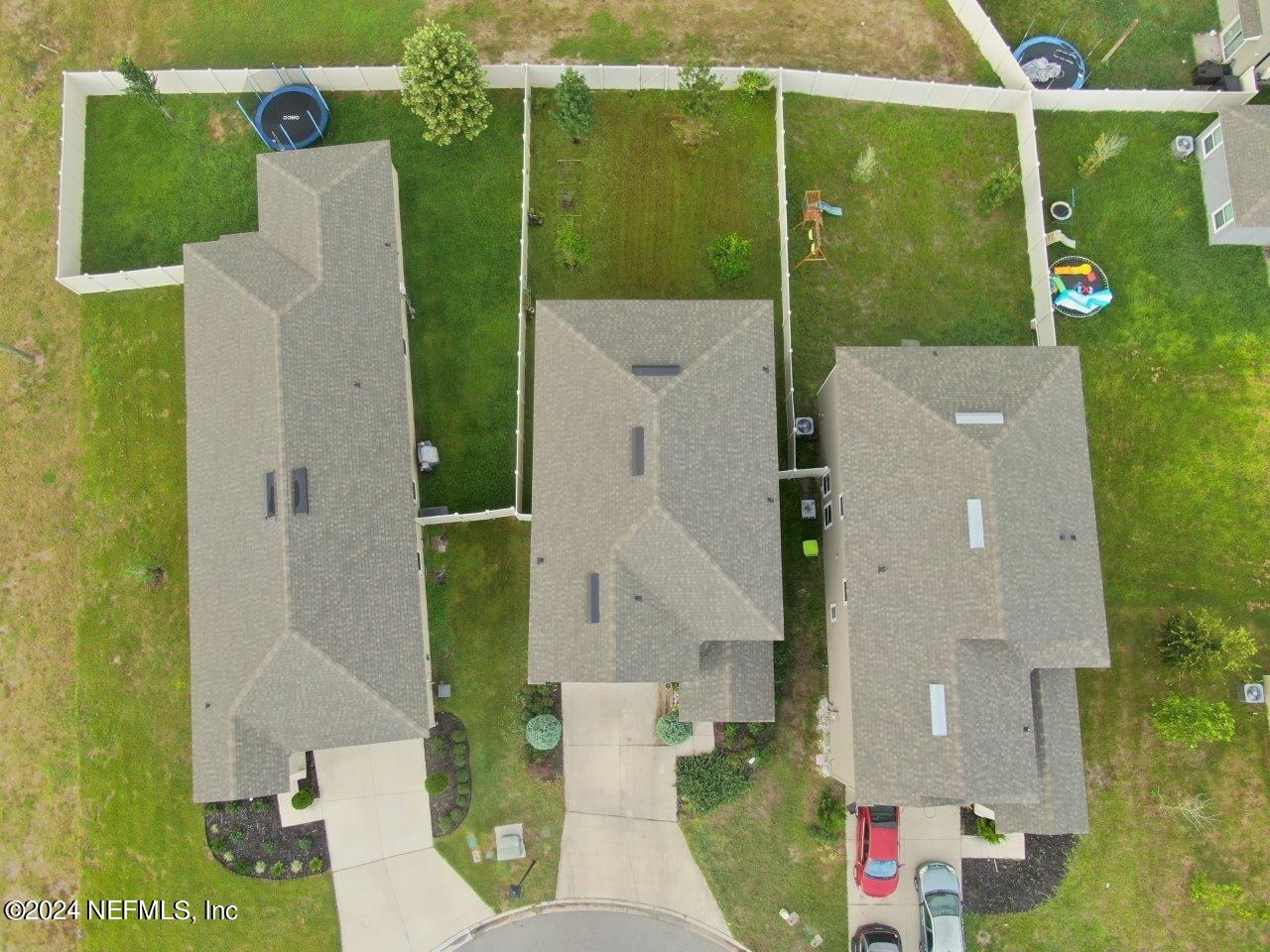 86013 Club Car Place Yulee, FL 32097 - Photo 1 of 28 an aerial view of a house with a yard
