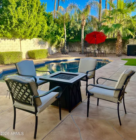 a living room with a table and a table