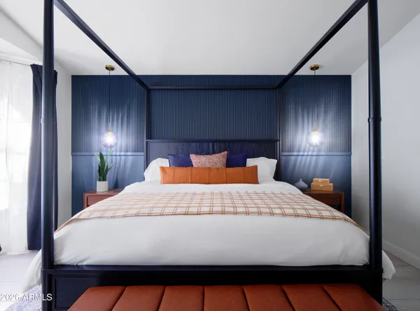 a view of a swimming pool with furniture